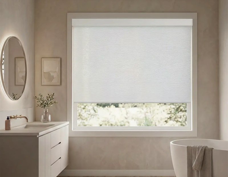 Sunlight through a window with a light filtering shade