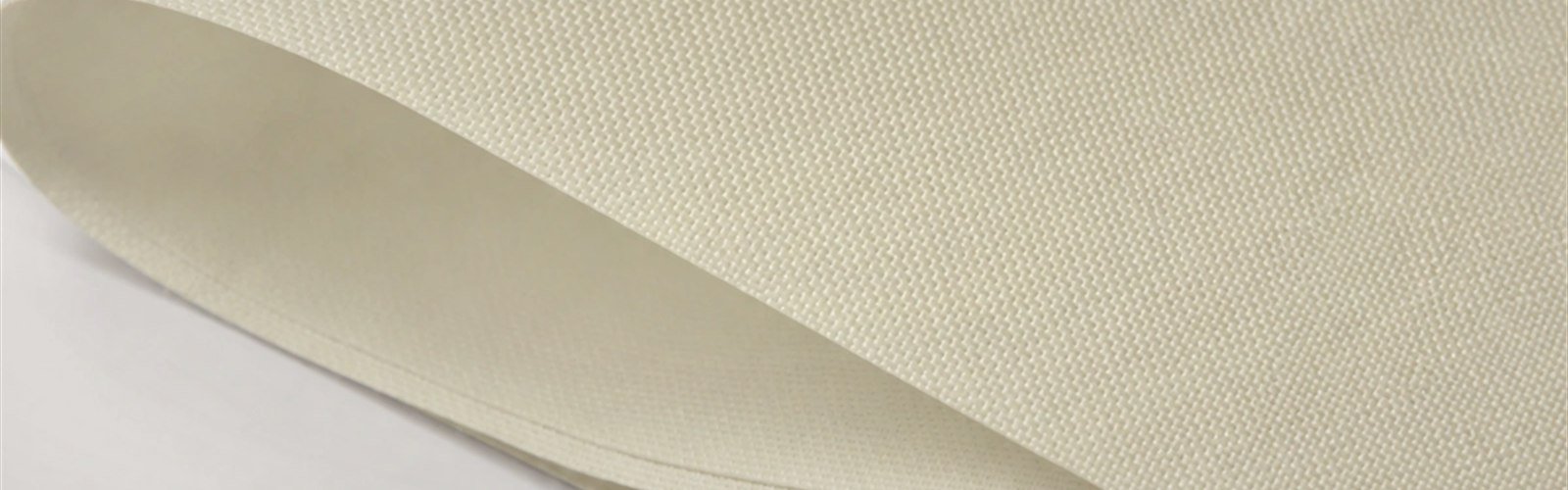 Warm neutral shade fabric with directional daylight