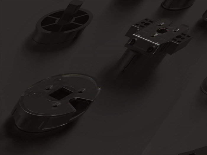 Motor and control components laid out before assembly